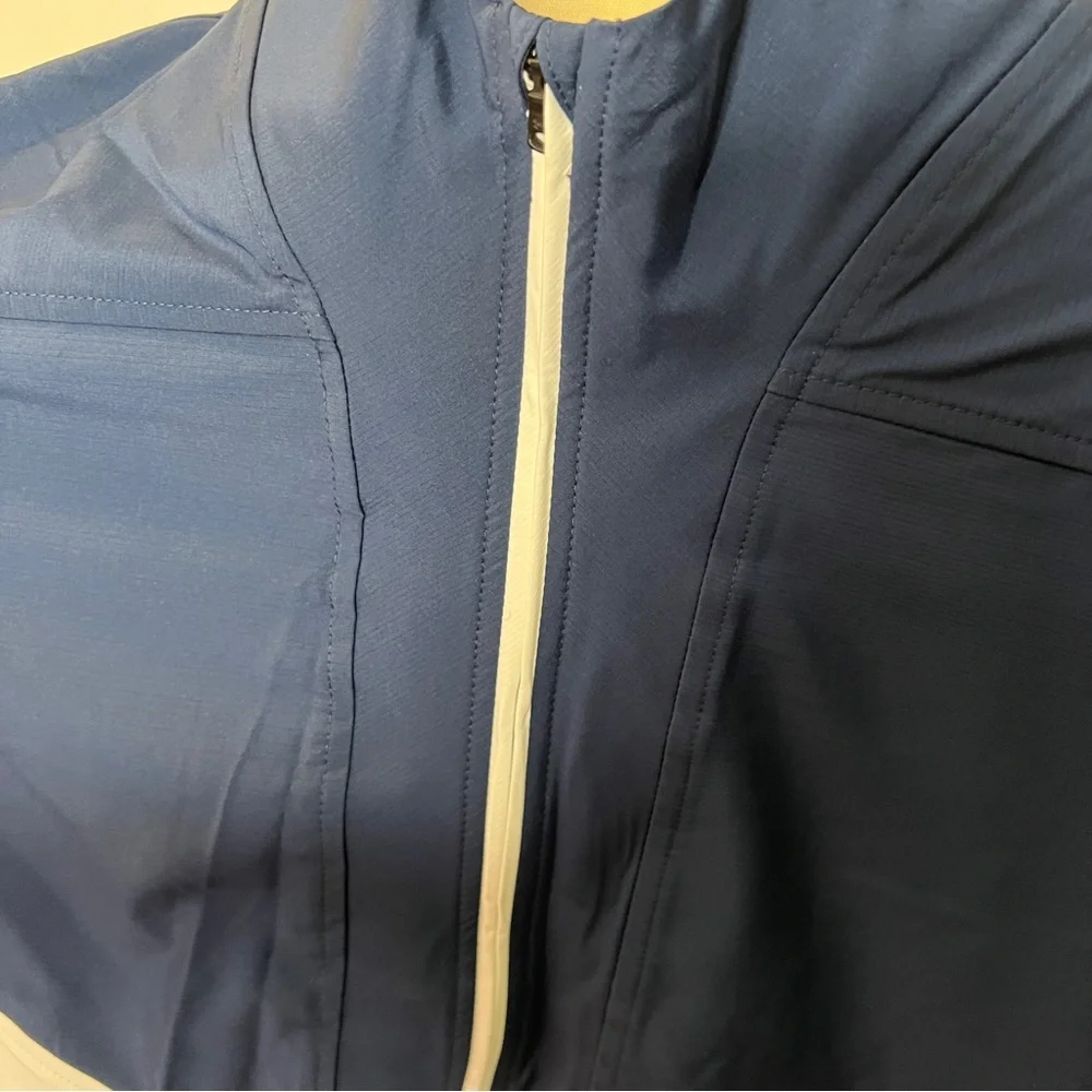 Under Armour blue and white colorblock windbreaker